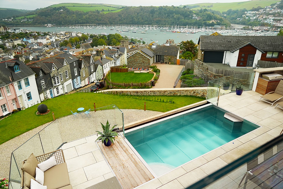 Resistance swim spa with Swimeo counter current unit in private back garden overlooking the harbour