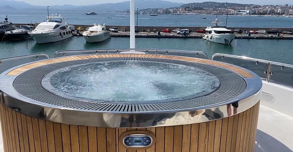 stainless steel hot tub on the deck of a private yacht