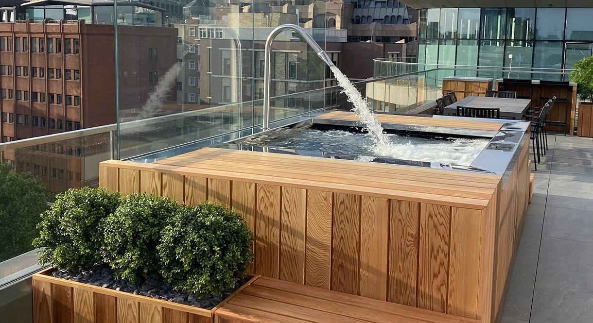stainless steel spa hot tub set above ground on a london skyscraper